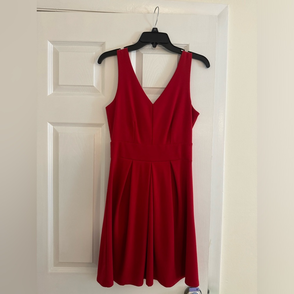 Red pleated dress with bow in the back 🎀